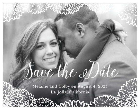 Flowers bursting with petals frame your engagement photo on the Full Bloom Save-the-Date Cards.