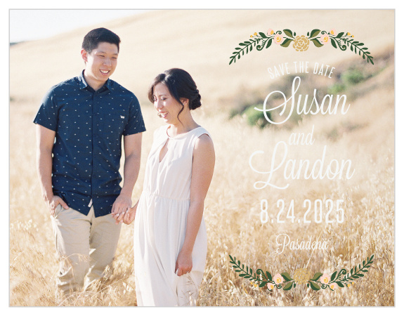 Your romantic engagement photo is the star of this card! It is overlaid with a delicate floral wreath and your information off to the right.