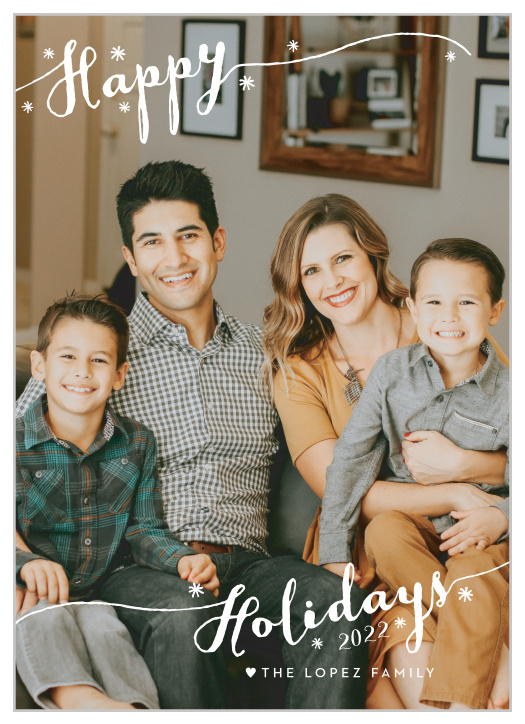 Our Luxury Script Holiday Cards offer the perfect blend of modern style and classic warmth, utilizing a swirling script and softly-falling snowflakes for a gorgeous look. With your favorite photo of your family decorating the background, these cards are a gorgeous way to say
"Happy Holidays!"