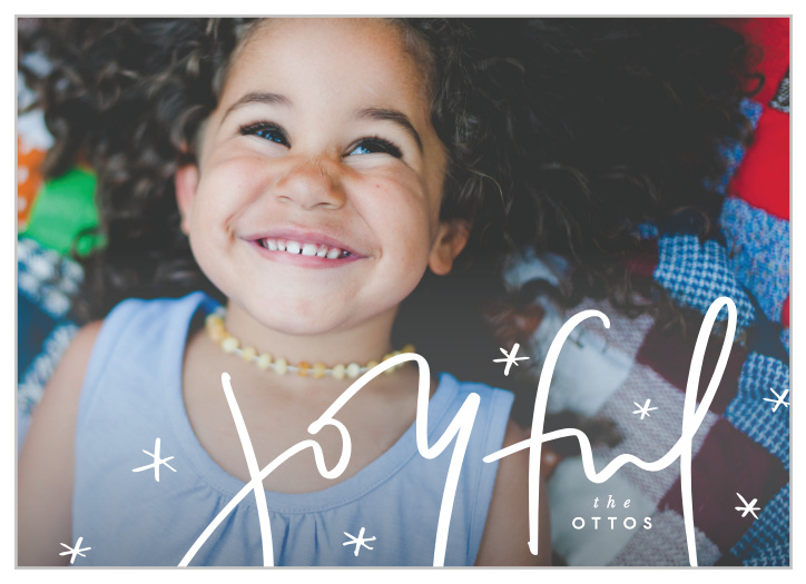 Give the gift of festive spirit to family and friends with the modern look of our Joyful Script Holiday cards.
