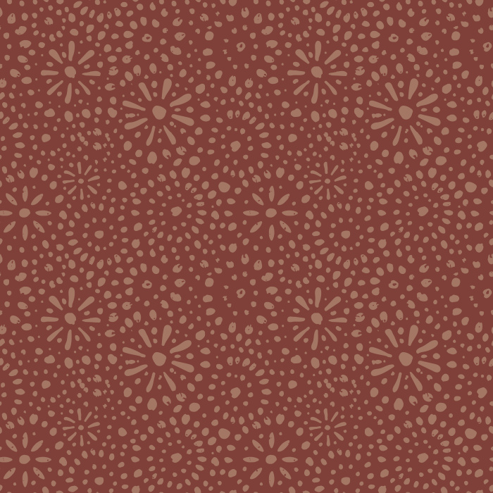 Energize your space with Stardusted Boho wallpaper, featuring a playful dotted starburst pattern in warm tan on a rich, earthy red background.