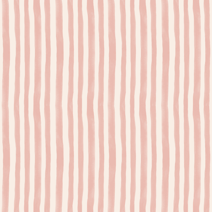 Handpainted Stripes wallpaper features playful, irregular vertical stripes in a warm blush pink and cream palette, adding a whimsical, artistic touch to any space.